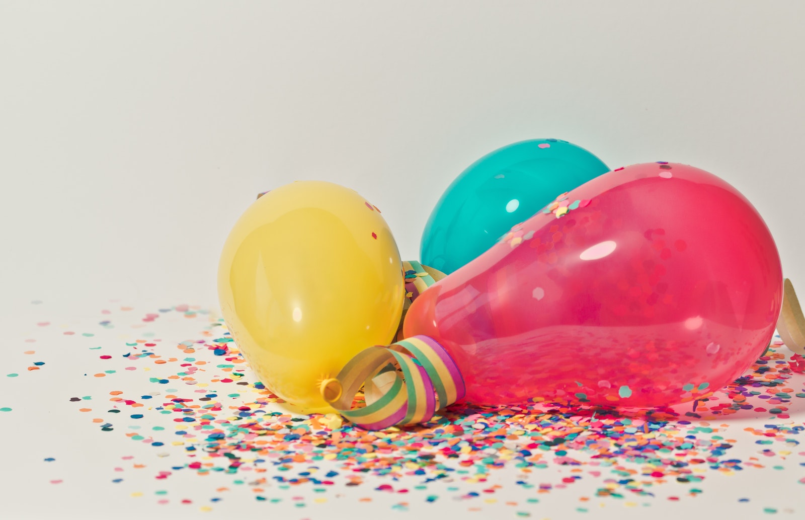 Yellow, Pink, and Blue Party Balloons - make time for fun - being a present mom